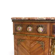 An antique French Louis XVI-style marble-top side cabinet