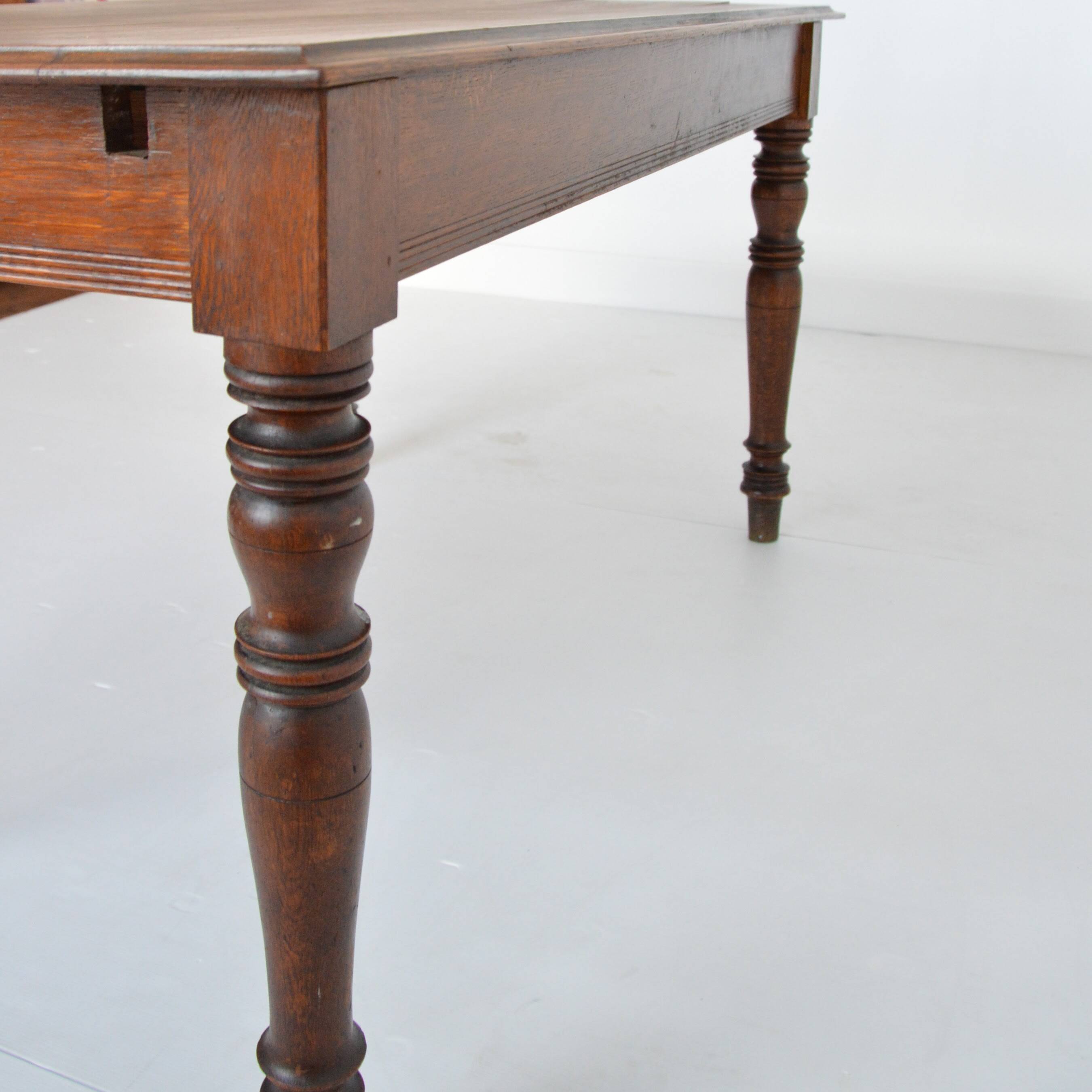 Farm table with extensions from the early 20th century.