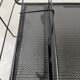 Perforated metal serving trolley in the Mathieu Matégot style