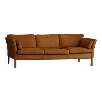 Danish Midcentury 3-seater canapé by Stouby in cognac brown leather, made in the 1970s.
