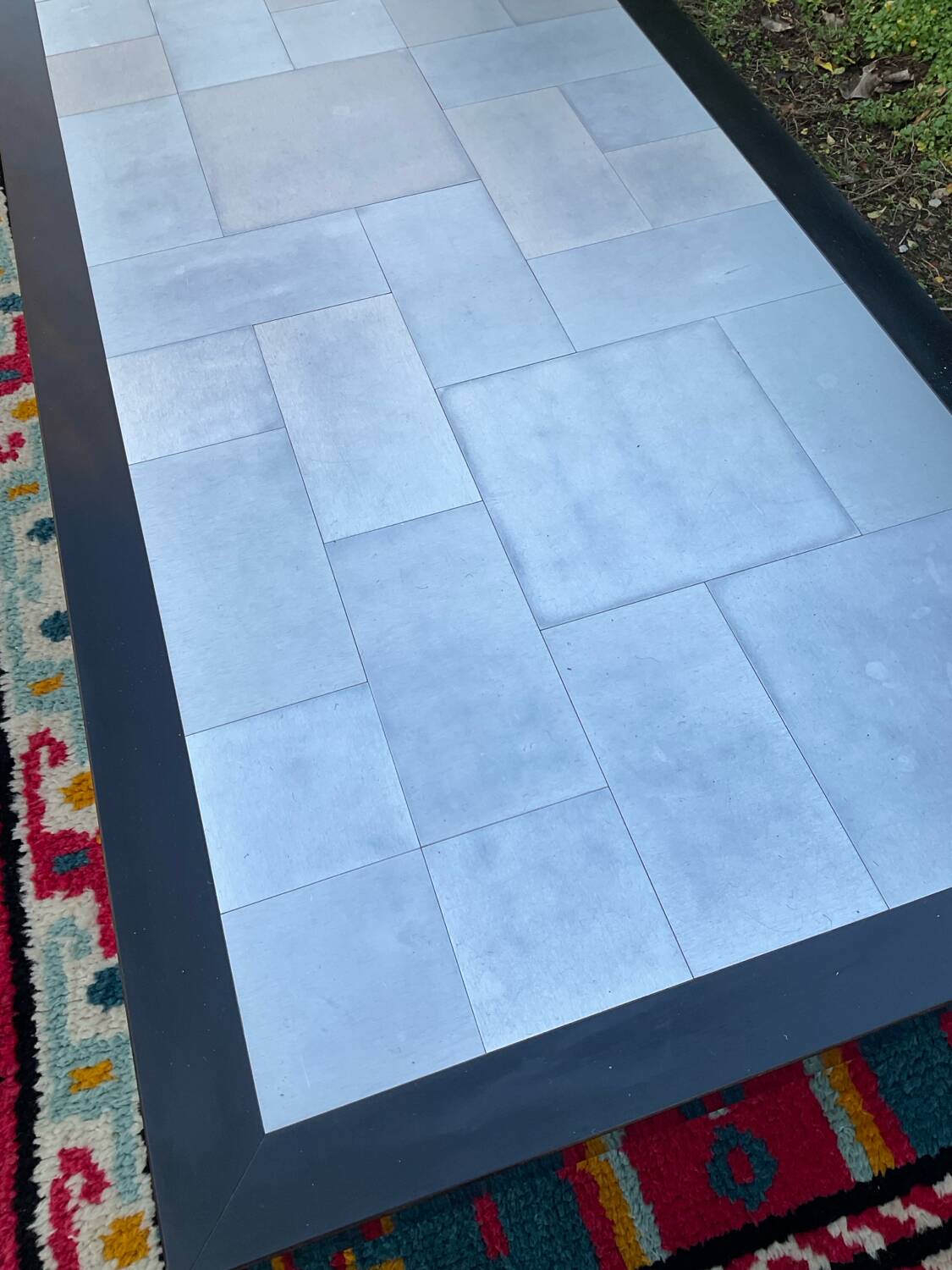 Vintage coffee table in stainless steel and black lacquered wood.