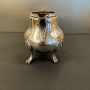 Antique silver-plated metal milk jug – Rococo style, chased decoration, early