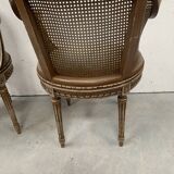 Pair of Louis XVI style basket armchairs in patinated beech, 20th century