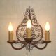 French triple wall sconce in wrought iron, early 20th century.