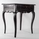Office table from the early 19th century Louis XV style in blackened wood