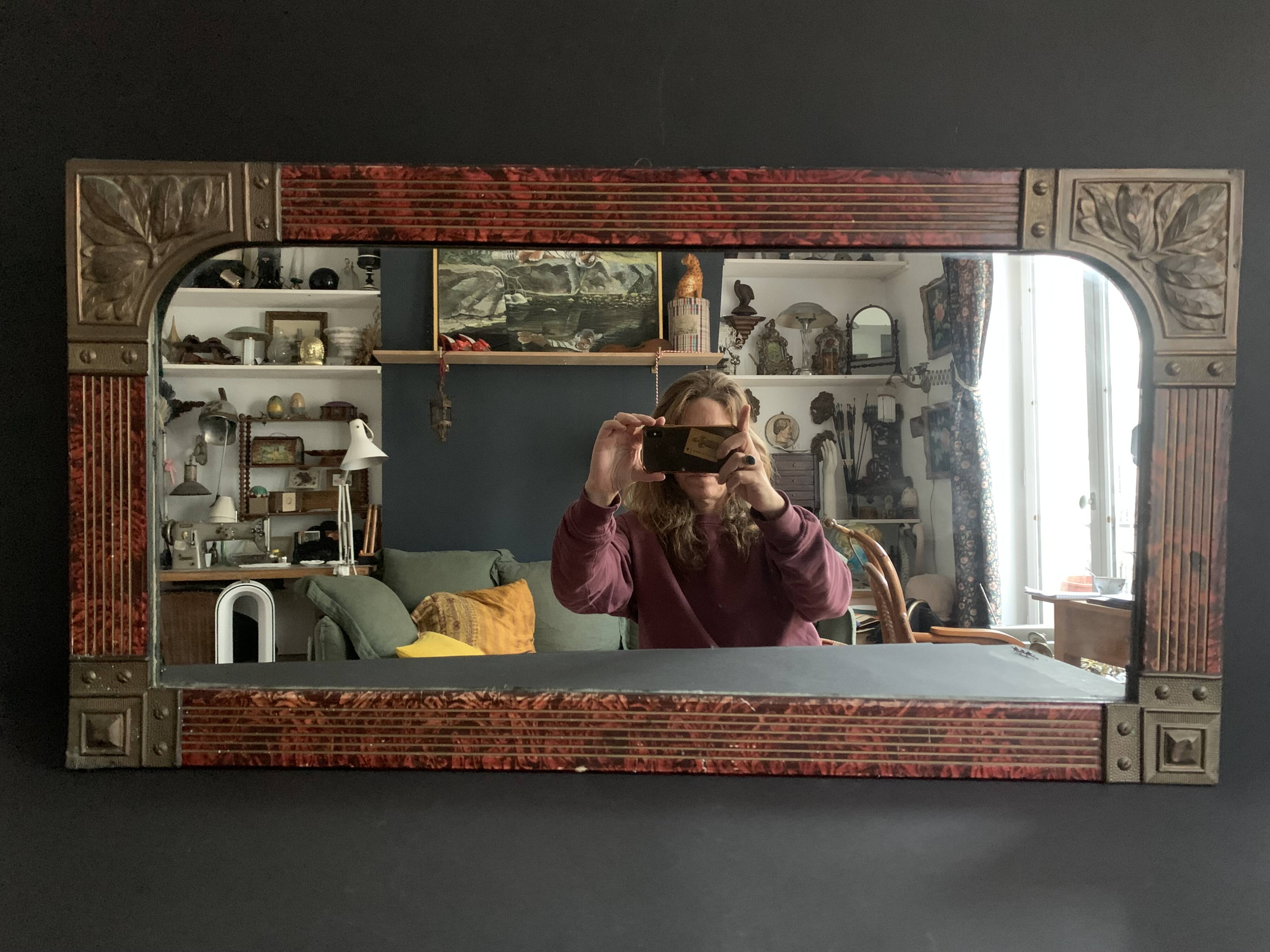 Hand painted art nouveau mirror decorated with chiseled brass, french mercury mirror from the 1920s