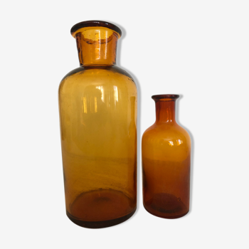 Duo of amber apothecary bottles