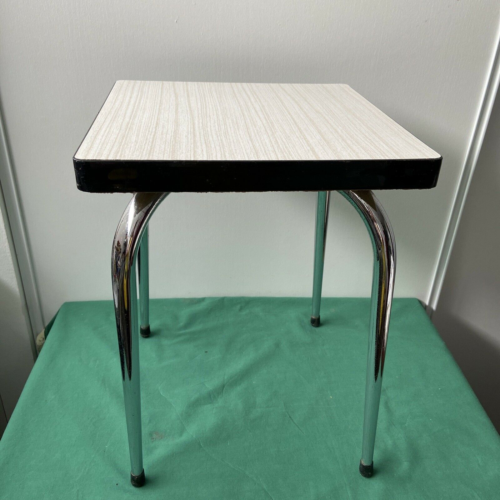 White stool in formica and metal