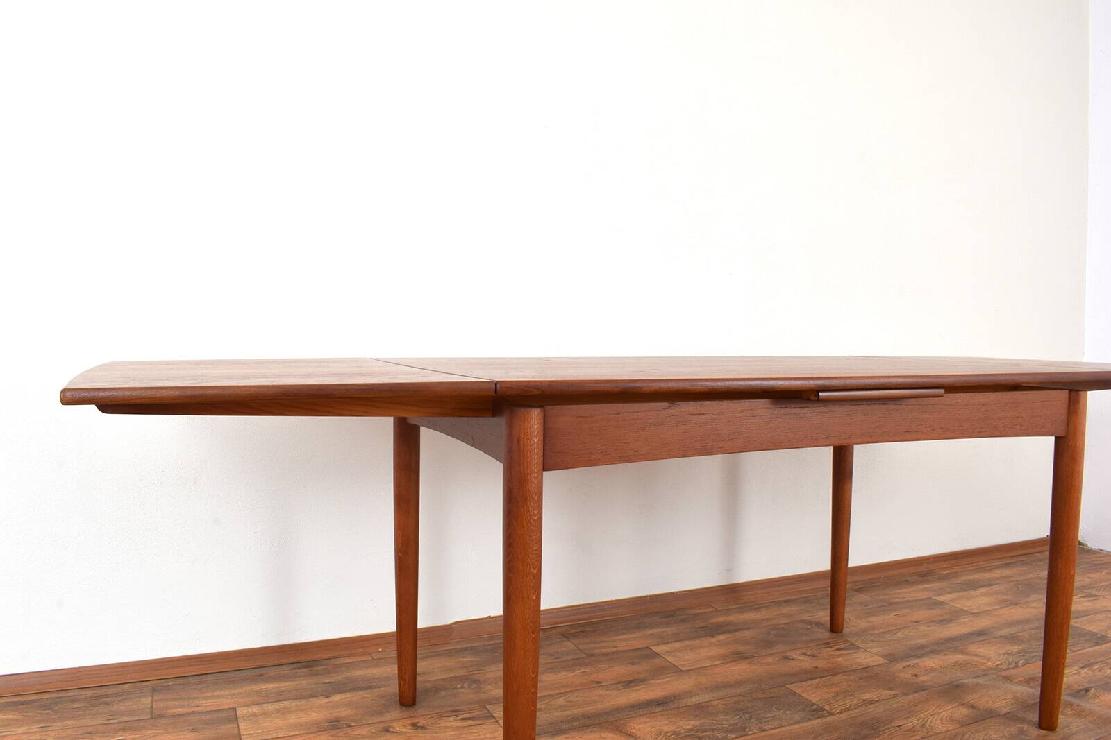 Mid-century Danish teak extendable dining table, 1960s.