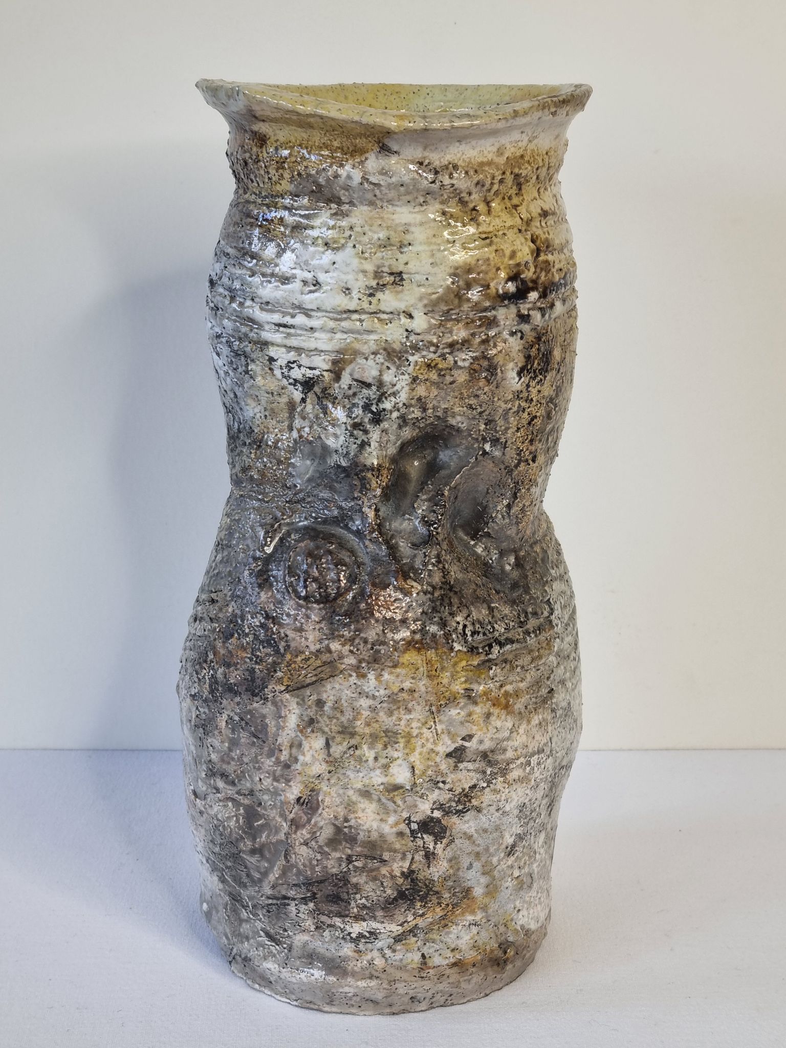 Enamelled ceramic roll vase