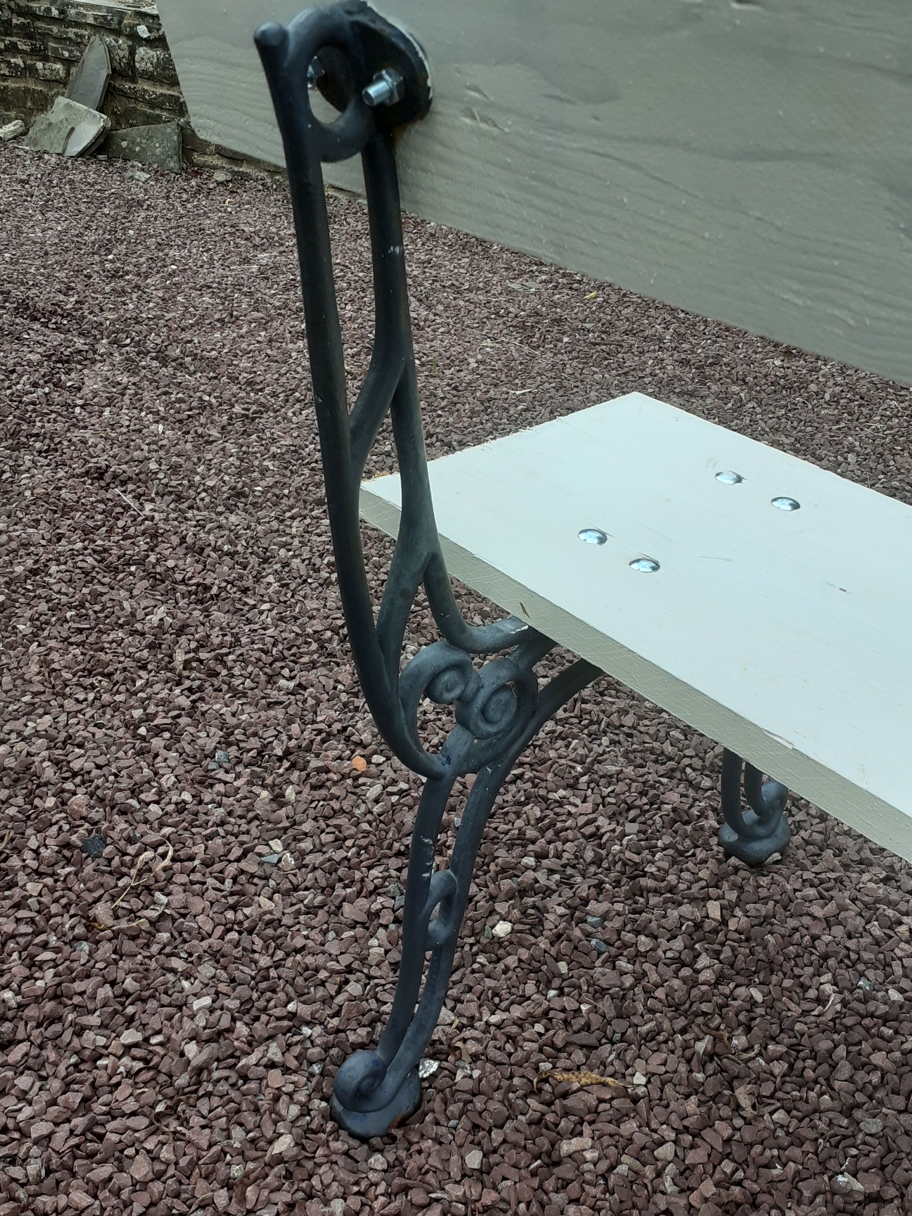 Garden bench with old cast-cast-or-cast-or-cast foot