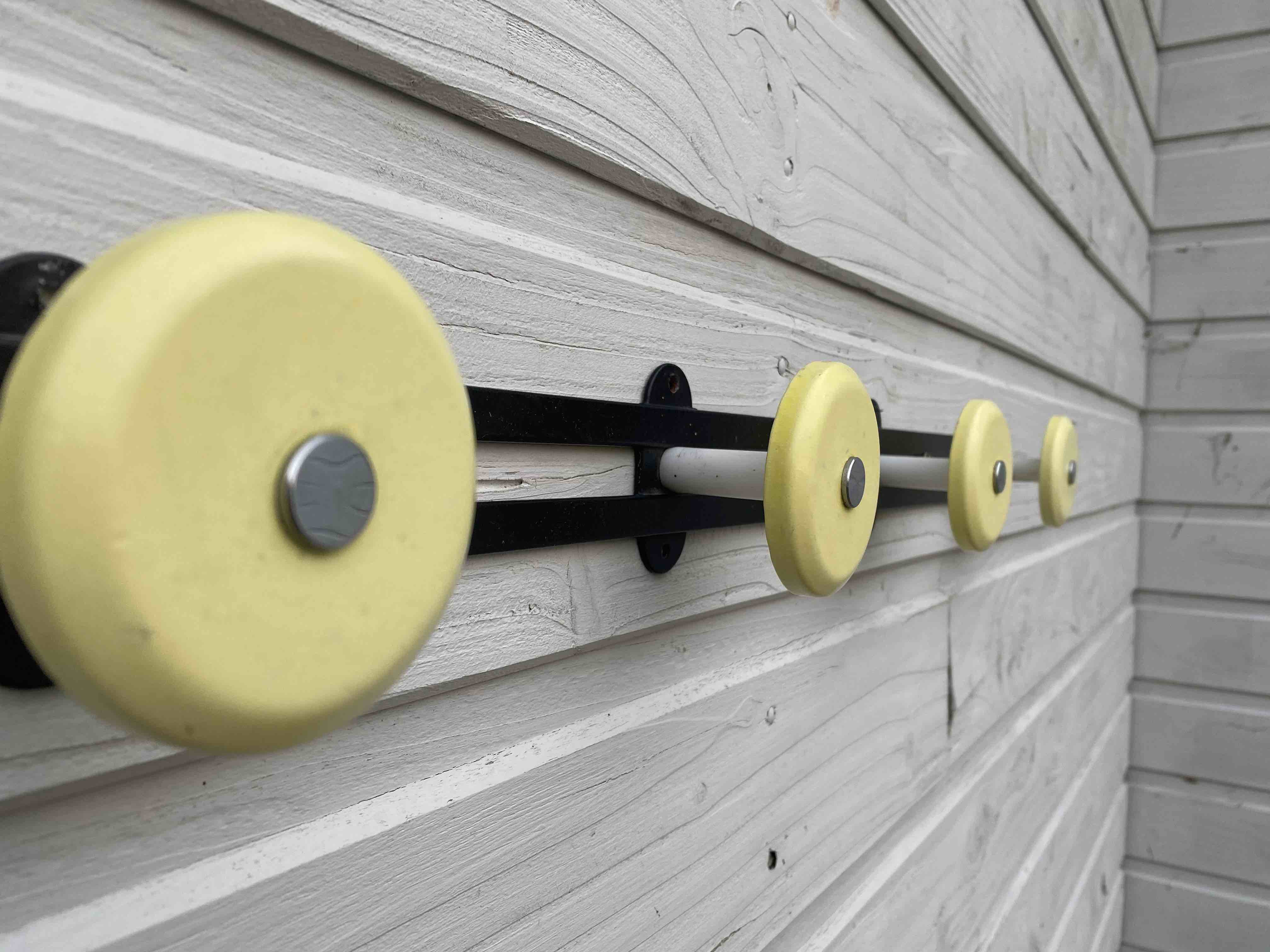 Yellow metal coat door