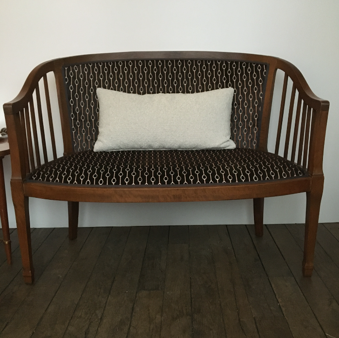 Old wooden and velvet bench