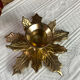 Pair of candlesticks, holly leaves, in brass
