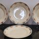 Old semi-deep plates in Terre de fer earthenware