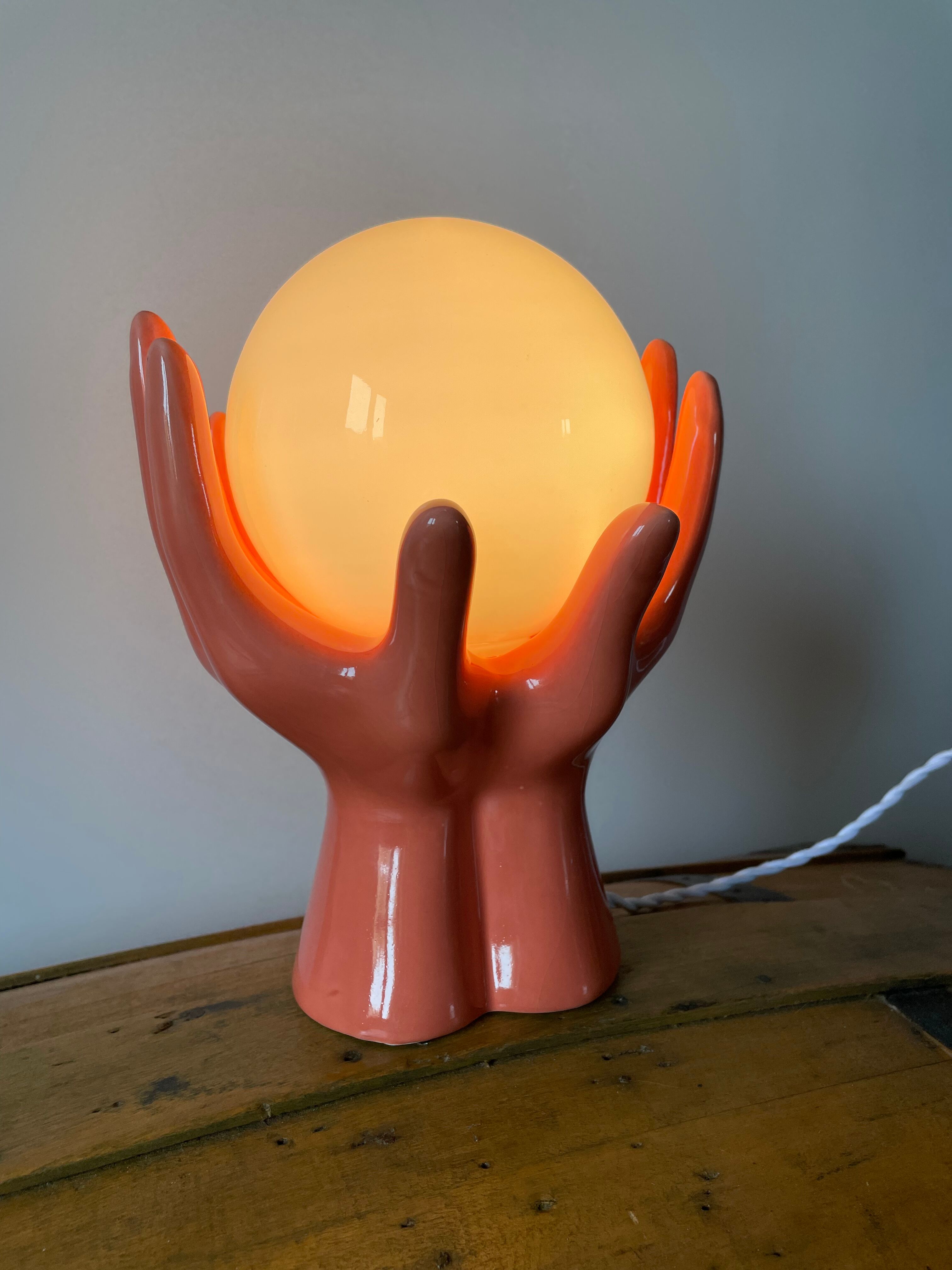 Hand lamp in ceramic color coral electrified to new