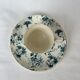 White porcelain cup with blue flowers