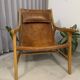 Colonial armchair in leather and wood