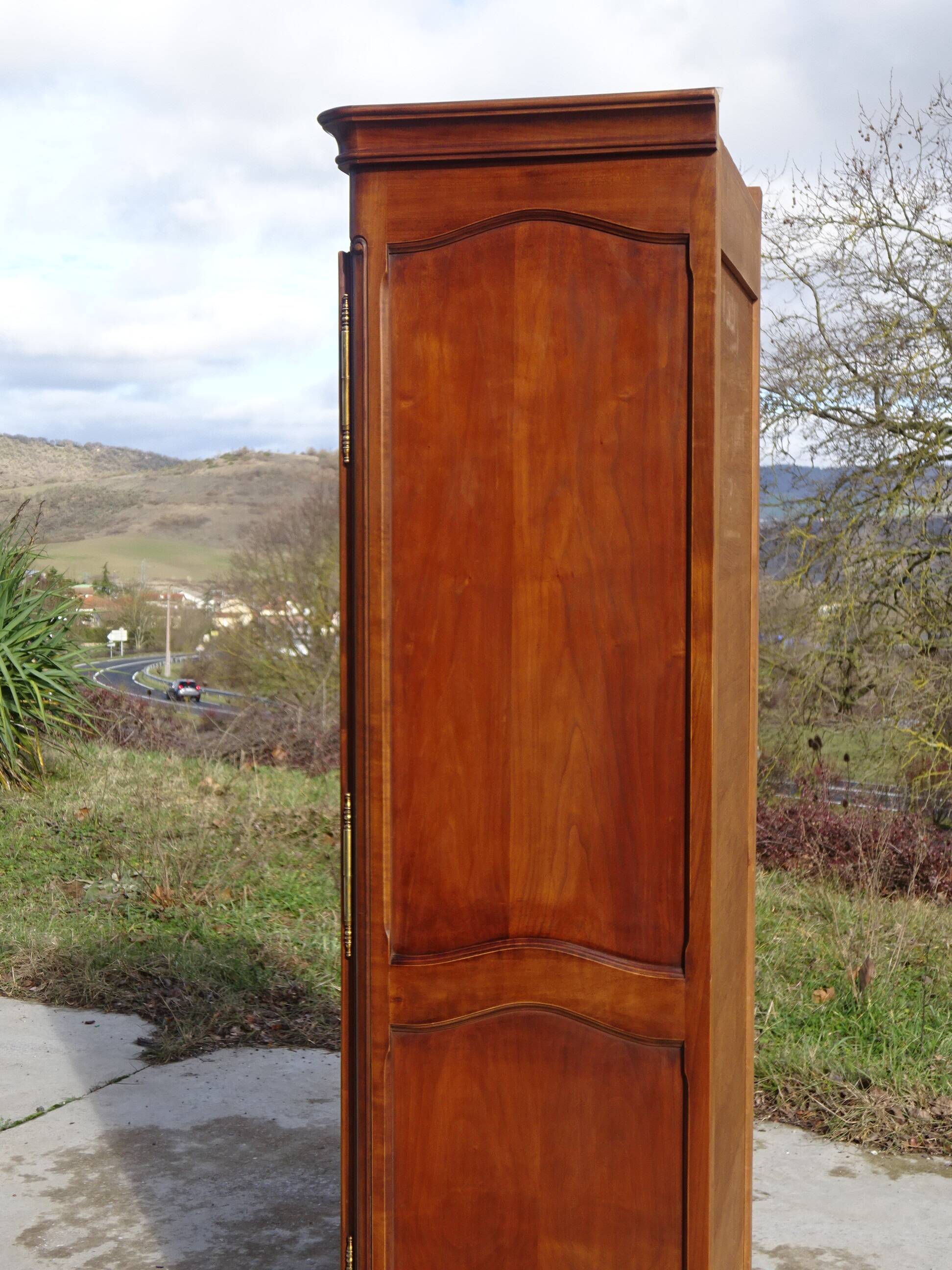 Louis XV style bonnetière in solid cherry wood
