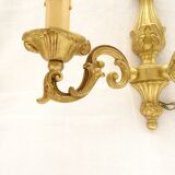 Pair of sconces in gilded bronze double candles