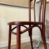 2 bistro chairs in arched and dark wood