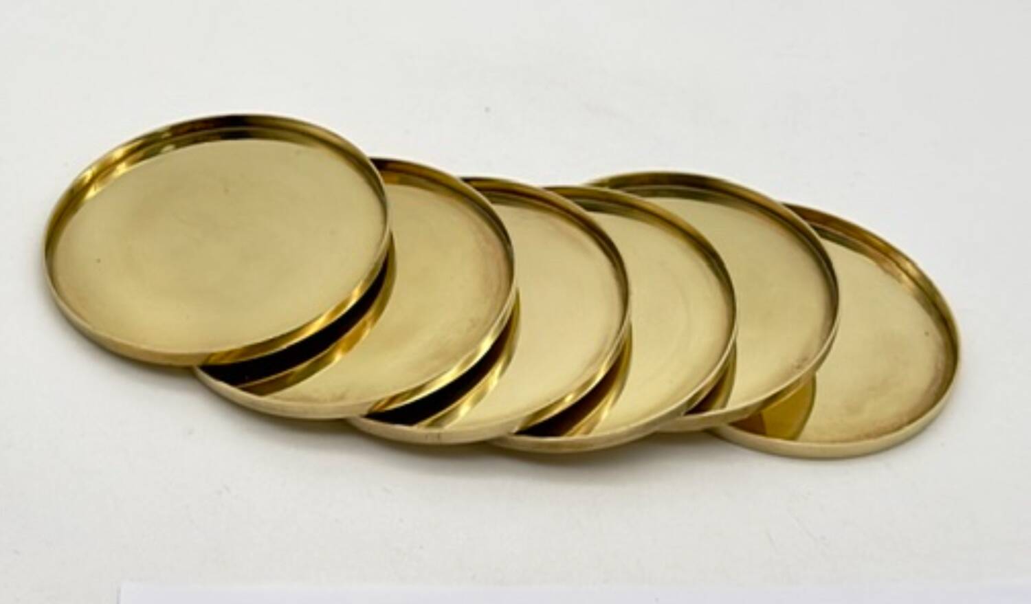 6 Coasters. Stelton. Brass