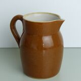 Pitcher or milk pot in speckled enamelled sandstone