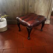 Red leather footrest in Chesterfield style, vintage 1970s.