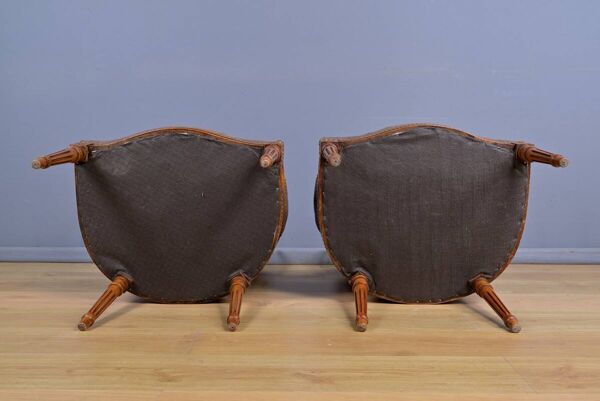 Paire de fauteuils en hêtre teinté, style Louis XVI – 1950