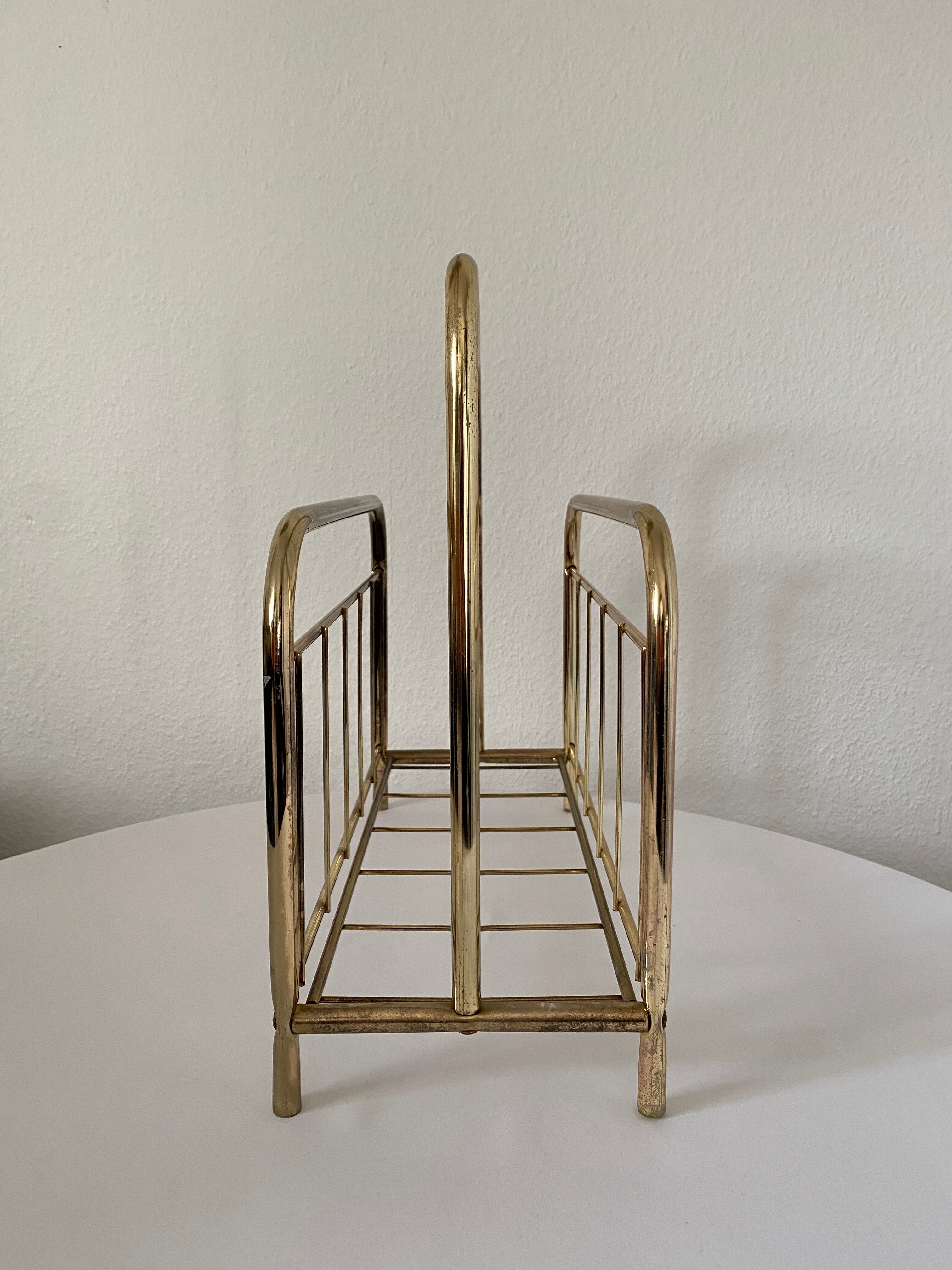 Gilded metal magazine door