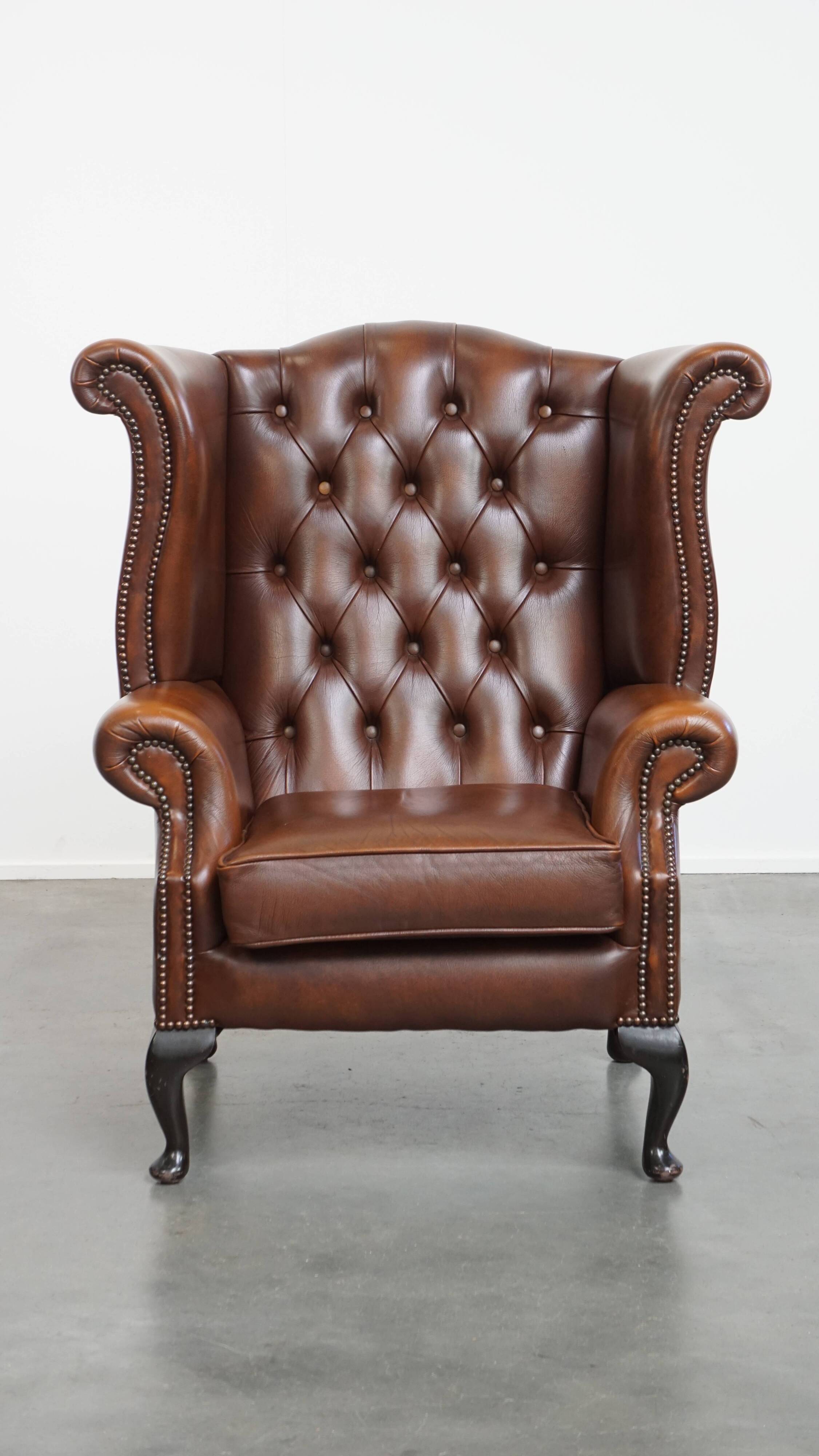 Chesterfield wing chair in dark brown English cowhide