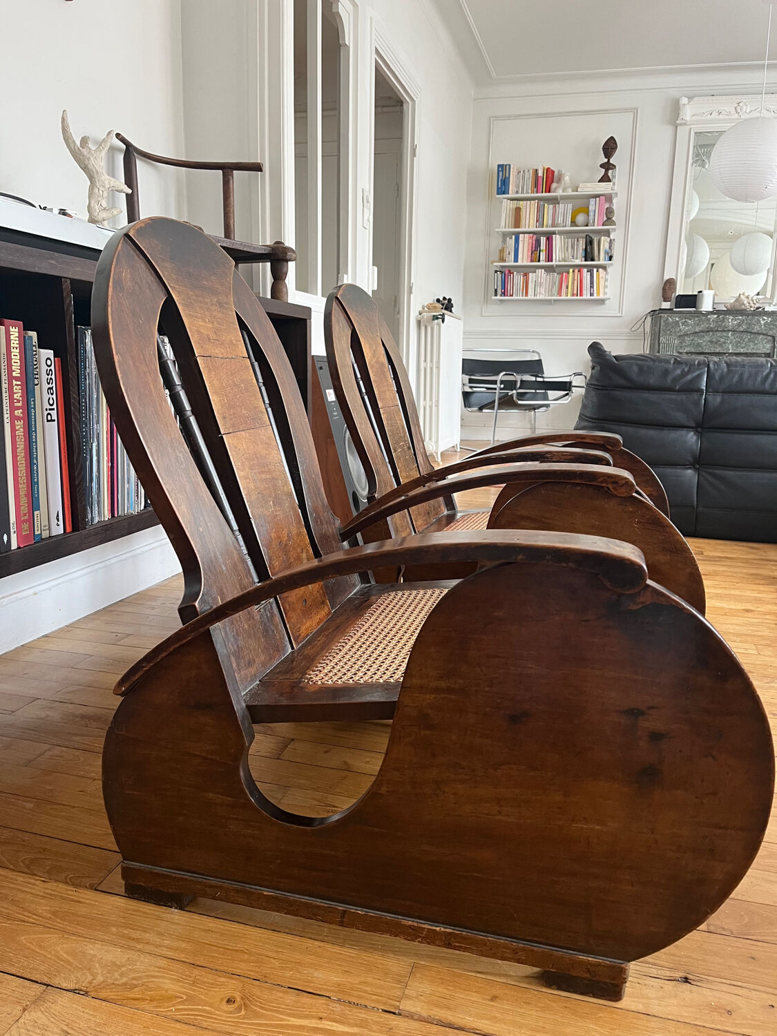Pair of Art Deco armchairs in wood and cane.