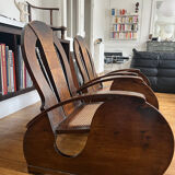 Pair of Art Deco armchairs in wood and cane.