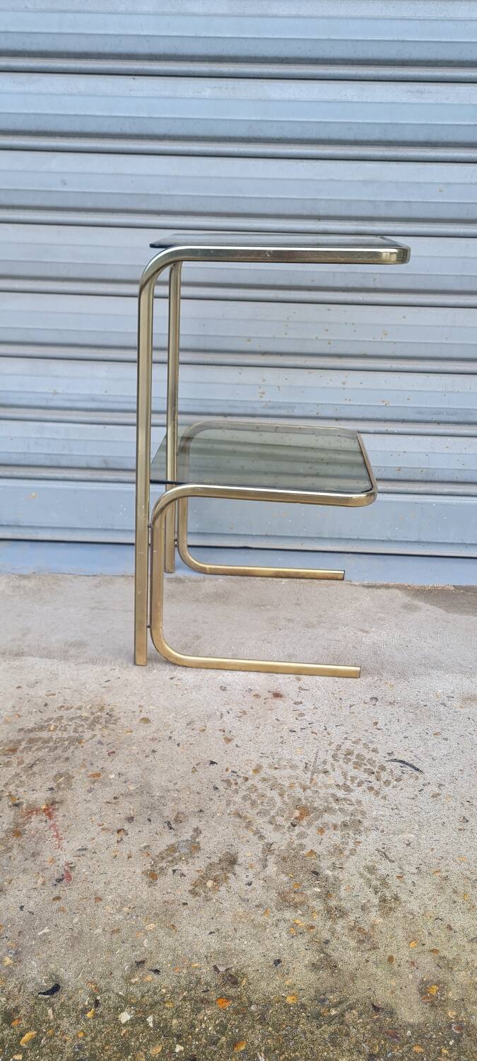 End table in gold metal and smoked glass