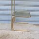 End table in gold metal and smoked glass