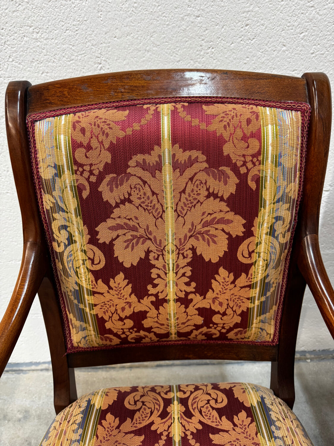 Pair of cross-back armchairs, Empire style, 19th century.