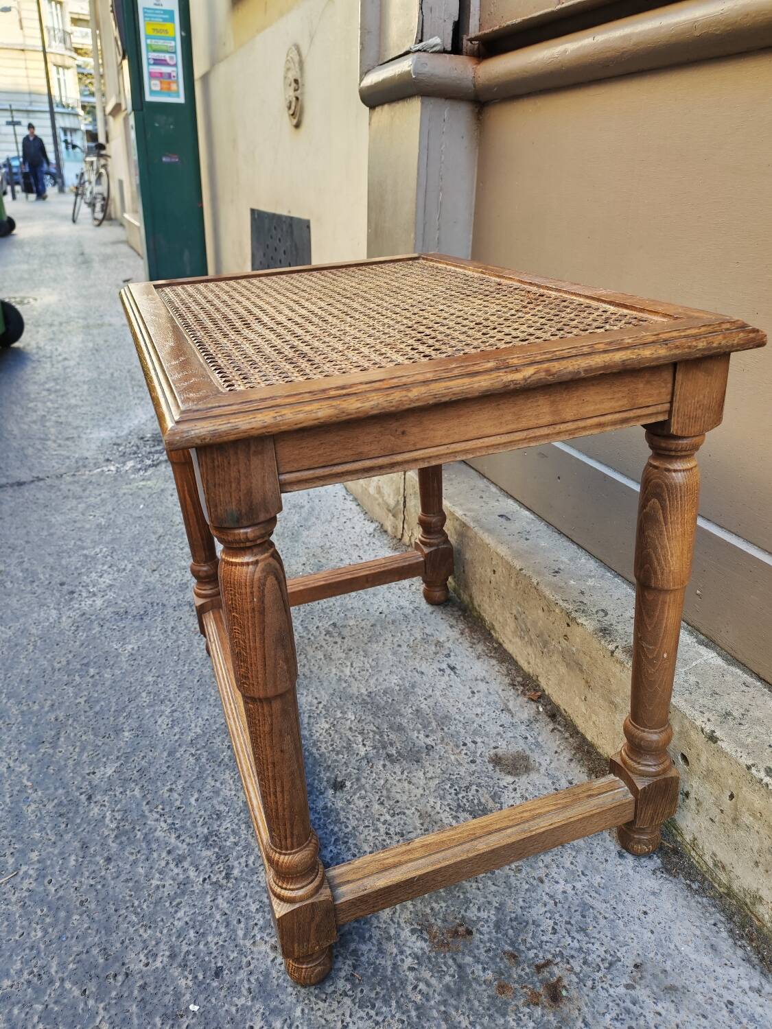 Wooden bench with caning