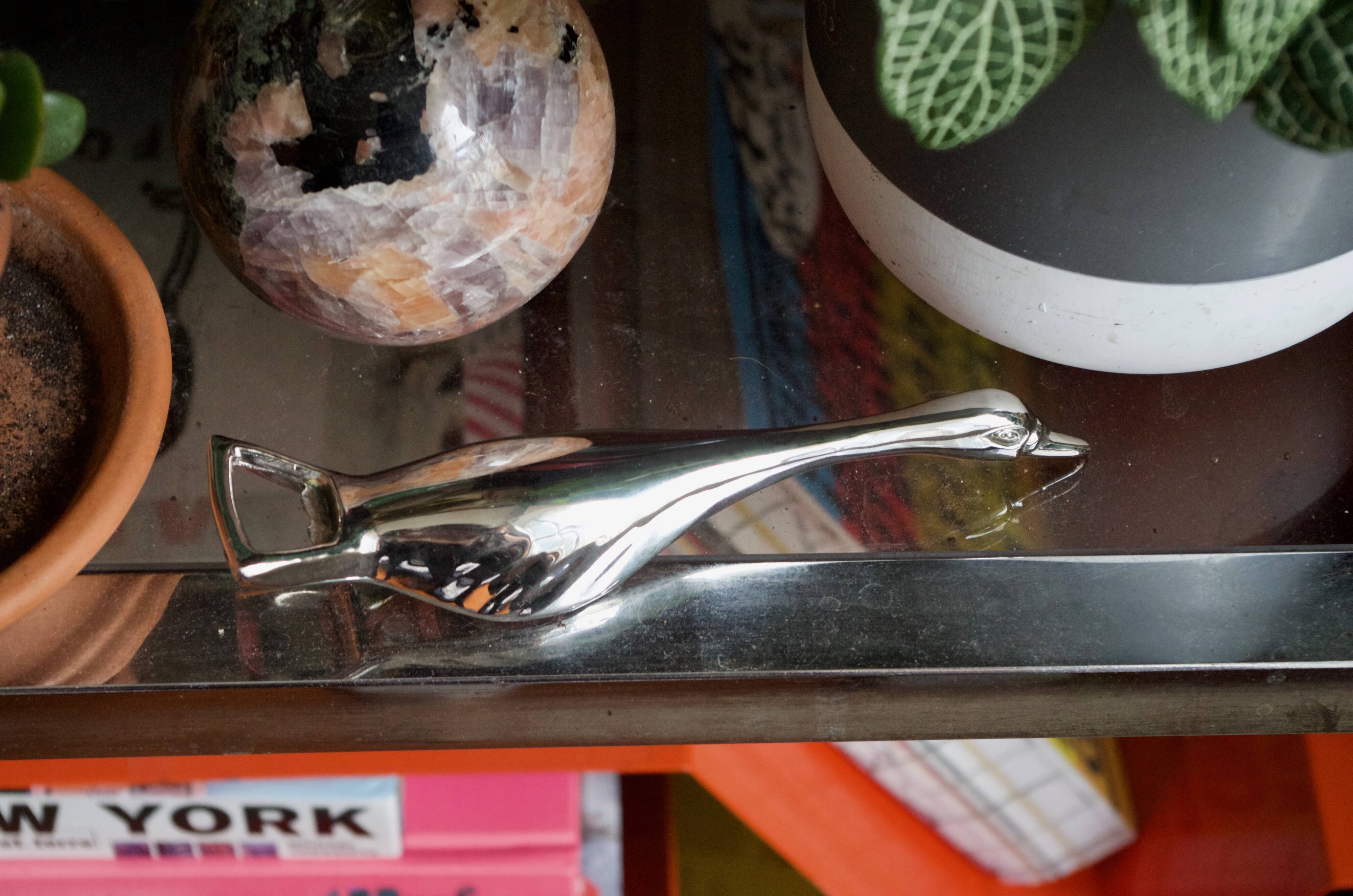 Vintage goose in flight bottle opener in silver metal
