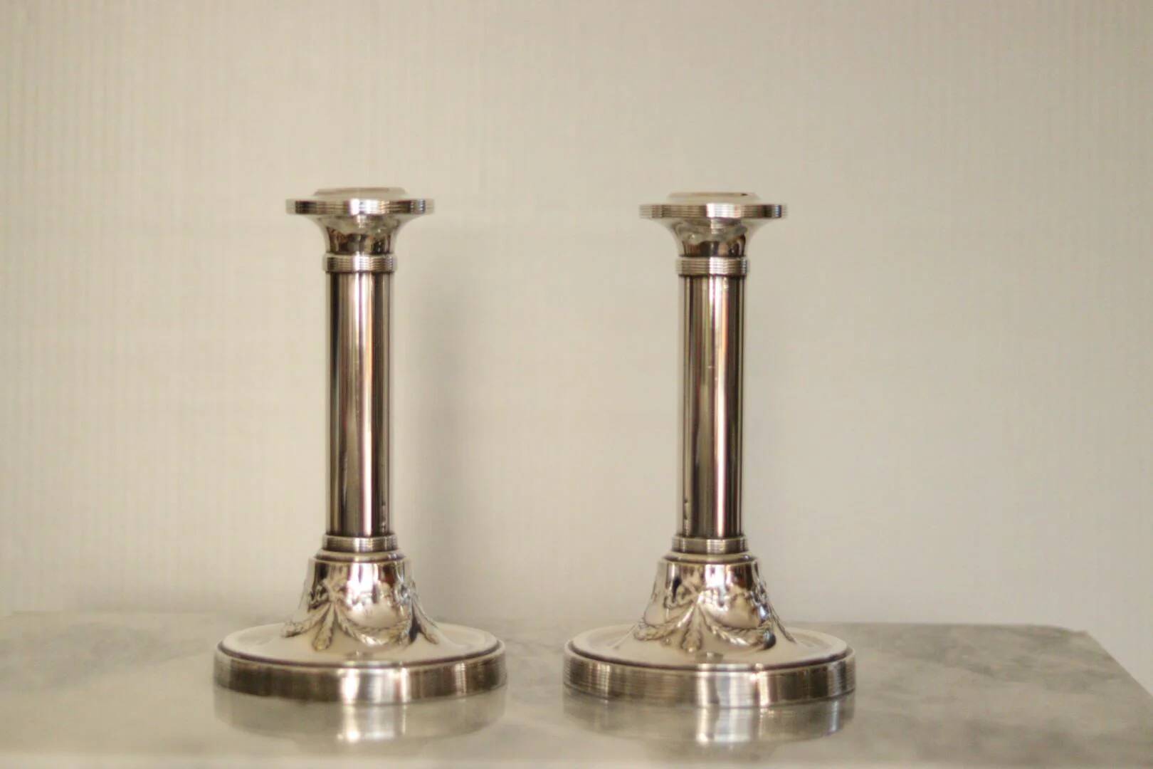 Pair of mid-century silver-plated metal candleholders