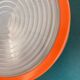 Large round Holophane wall lamp in glass and orange metal, industrial vintage decoration