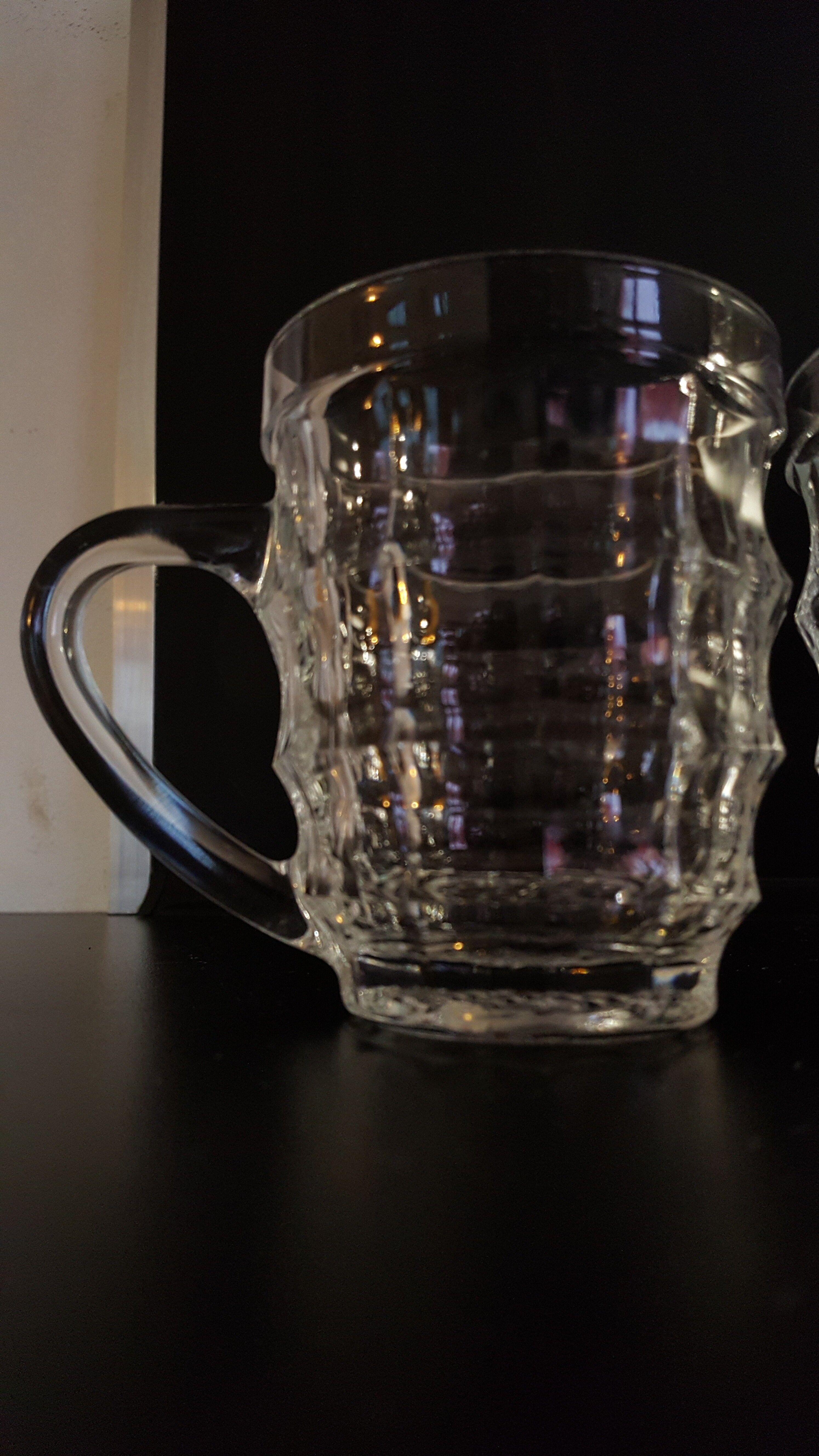 4 old beer steins
