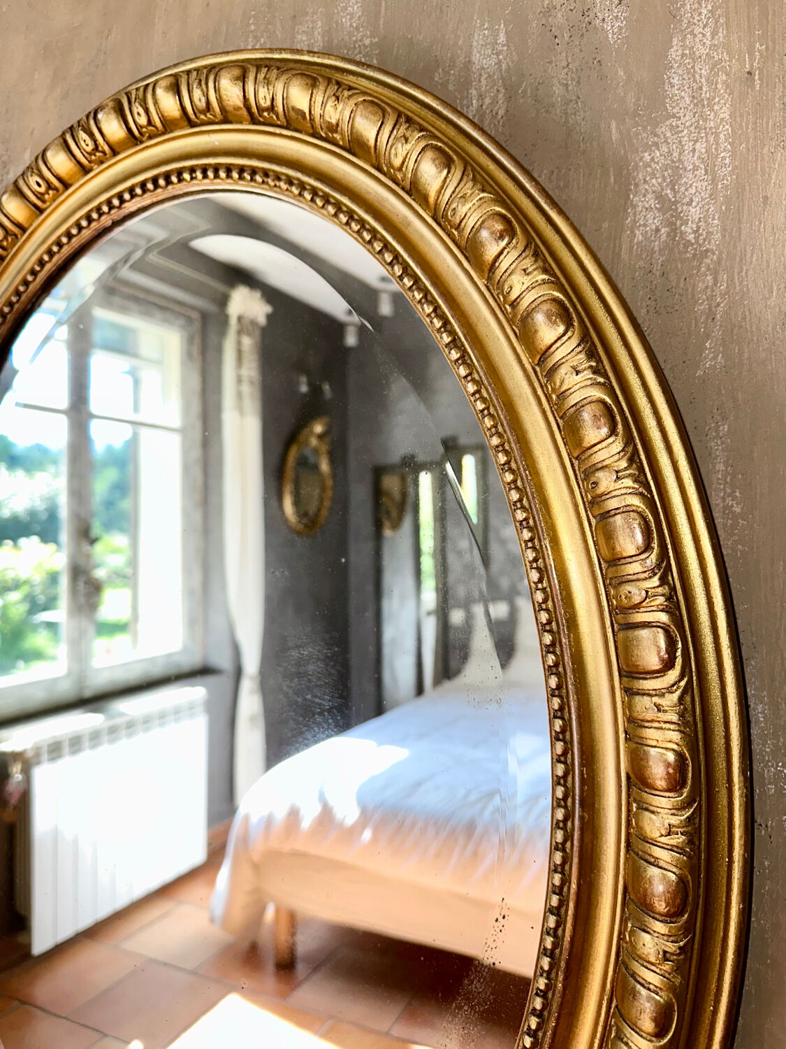 Old oval mirror late nineteenth