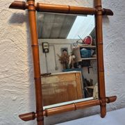 Vintage wooden mirror imitating bamboo