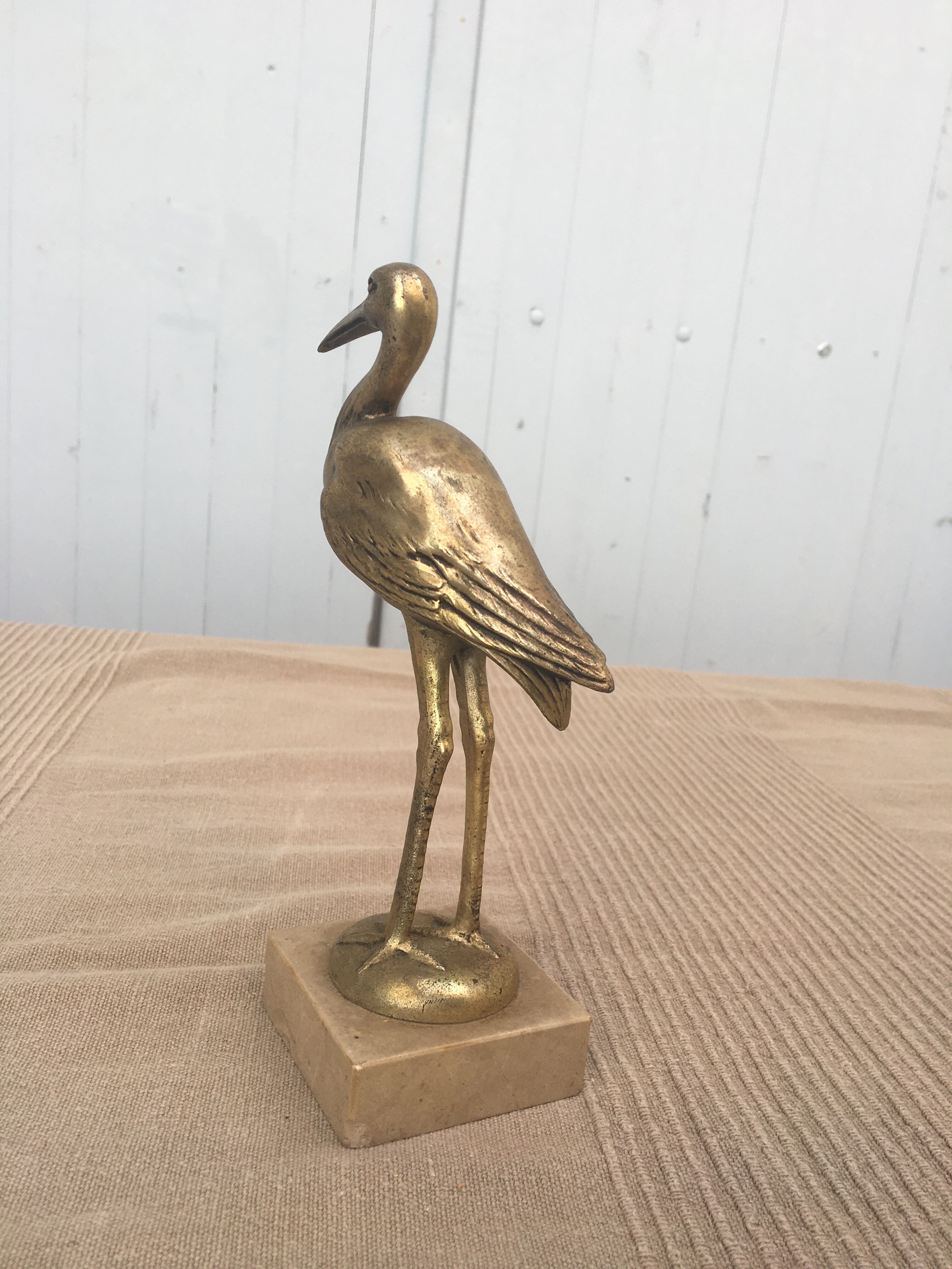 Heron brass statuette