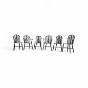 A slightly weathered Windsor wheelback dining set (7) by Oirschotse Meubelindustrie 1950s