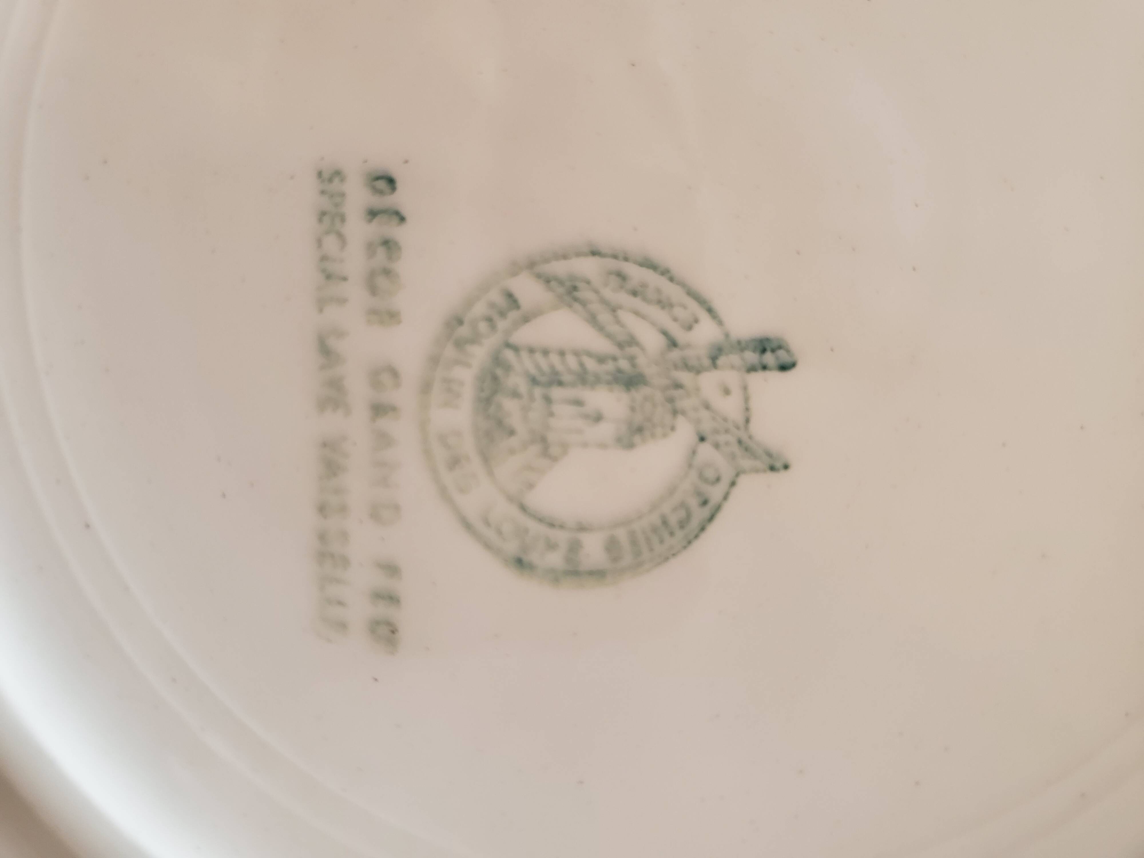 5 cups and ceramic saucers