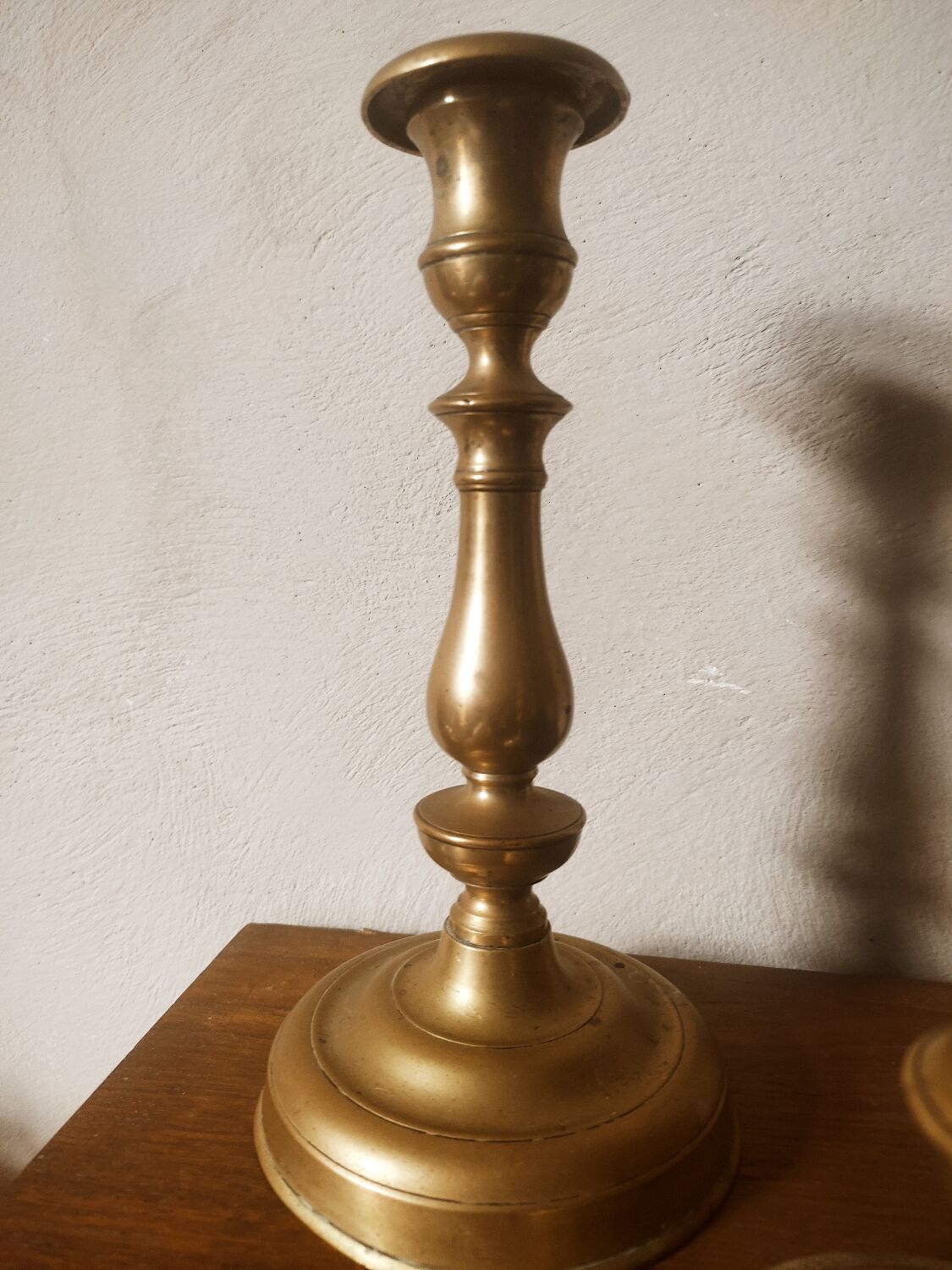 Duo of brass candle holders
