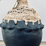 Clay pot and raffia