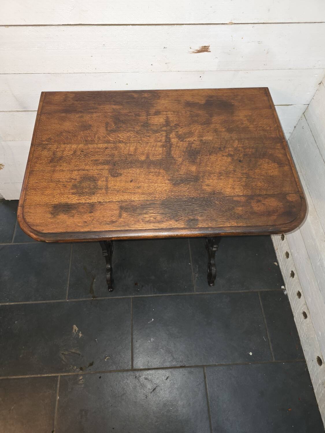 Bistro table with cast iron legs and oak top