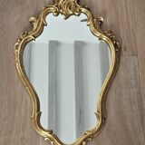 Rockery mirror under gilded frame